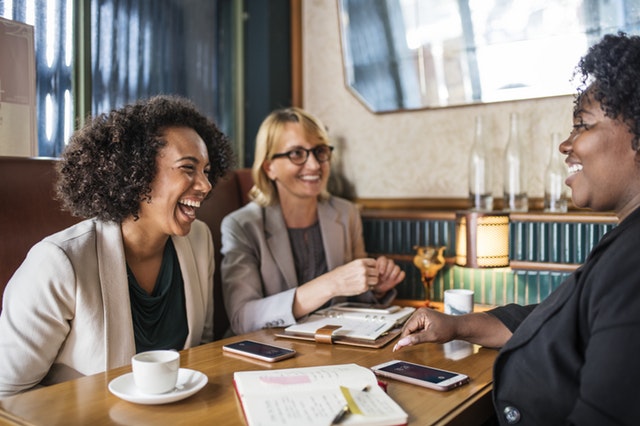 Woman who treated her hearing loss having a conversation 