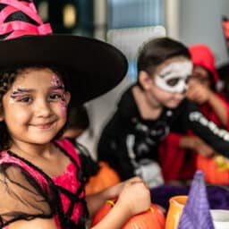 Group of kids in halloween costumes